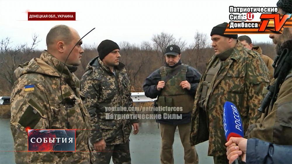 Народные ополченцы и украинские военные в Донецкой области Народные ополченцы и украинские военные в Донецкой области