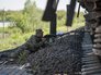 Боец народного ополчения контролирует железнодорожные пути около Луганска Боец народного ополчения контролирует железнодорожные пути около Луганска
