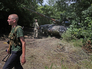 Танк Т-64 и бойцы ополчения в районе блокпоста у поселка Металлист Танк Т-64 и бойцы ополчения в районе блокпоста у поселка Металлист