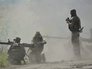 Солдаты украинской армии во время боевых действий против ополченцев Солдаты украинской армии во время боевых действий против ополченцев