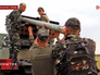 Украинские военные заряжают систему залпового огня "Град" в Луганской области Украинские военные заряжают систему залпового огня "Град" в Луганской области