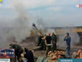 Украинские военные ведут обстрел Украинские военные ведут обстрел