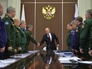 Владимир Путин во время совещания с военачальниками Владимир Путин во время совещания с военачальниками