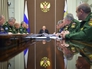 Владимир Путин во время совещания с военачальниками Владимир Путин во время совещания с военачальниками