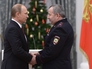 Президент России Владимир Путин награждает званием Героя РФ майора полиции Абубакара Костоева Президент России Владимир Путин награждает званием Героя РФ майора полиции Абубакара Костоева