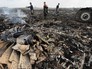 Место крушения малайзийского Boeing 777 на Украине Место крушения малайзийского Boeing 777 на Украине