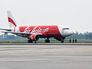 Самолет авиакомпании AirAsia Самолет авиакомпании AirAsia