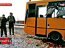 Украинские силовики возле расстрелянного автобуса в Донецкой области Украинские силовики возле расстрелянного автобуса в Донецкой области