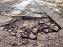 Выбоина на асфальте Выбоина на асфальте
