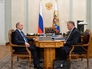 Президент России Владимир Путин и президент ОАО "Российские железные дороги" Владимир Якунин во время встречи Президент России Владимир Путин и президент ОАО "Российские железные дороги" Владимир Якунин во время встречи