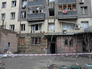 Пострадавший в результате обстрела жилой многоэтажный дом в городе Донецке Пострадавший в результате обстрела жилой многоэтажный дом в городе Донецке