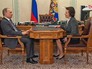 Президент России Владимир Путин и глава Ханты-Мансийского автономного округа Наталья Комарова Президент России Владимир Путин и глава Ханты-Мансийского автономного округа Наталья Комарова