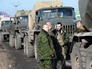 Ополченцы ДНР во время отвода системы залпового огня "Град" от Донецка Ополченцы ДНР во время отвода системы залпового огня "Град" от Донецка