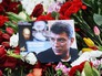 Цветы и фотография на месте убийства политика Бориса Немцова Цветы и фотография на месте убийства политика Бориса Немцова