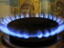 Горящая газовая конфорка Горящая газовая конфорка