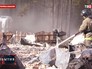 Сотрудник МЧС России работает на месте пожара Сотрудник МЧС России работает на месте пожара