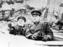 Командующий 8-й гвардейской армией генерал-полковник В.И.Чуйков и член военного совета армии А.М.Пронин стоят с биноклями на наблюдательном пункте Командующий 8-й гвардейской армией генерал-полковник В.И.Чуйков и член военного совета армии А.М.Пронин стоят с биноклями на наблюдательном пункте