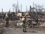 Спасатели МЧС России на месте сгоревшего поселка Спасатели МЧС России на месте сгоревшего поселка