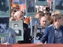 Президент Российской Федерации Владимир Путин и актер театра имени Вахтангова Василий Лановой приняли участие в шествии "Бессмертного полка" Президент Российской Федерации Владимир Путин и актер театра имени Вахтангова Василий Лановой приняли участие в шествии "Бессмертного полка"