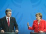Президент Украины Петр Порошенко и канцлер Германии Ангела Меркель Президент Украины Петр Порошенко и канцлер Германии Ангела Меркель