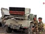 Украинские военные заряжают РСЗО "Град" Украинские военные заряжают РСЗО "Град"