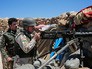Военнослужащие Иракского Курдистана ведут стрельбу Военнослужащие Иракского Курдистана ведут стрельбу