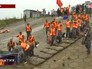 Спасатели на берегу Янцзы у места катастрофы Спасатели на берегу Янцзы у места катастрофы