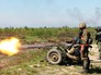 Украинские военные ведут обстрел в Донбассе Украинские военные ведут обстрел в Донбассе