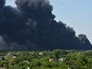 Дым от пожара на территории нефтебазы Дым от пожара на территории нефтебазы