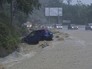 Автомобилисты на выезде из города Сочи во время ливня Автомобилисты на выезде из города Сочи во время ливня