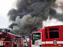 Пожарные машины на месте возгорания Пожарные машины на месте возгорания