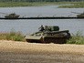 Машина инженерного обеспечения около понтонной перепраы Машина инженерного обеспечения около понтонной перепраы