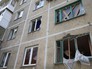 Жилой многоквартирный дом, пострадавший в результате обстрела киевскими силовиками поселка Октябрьский в Куйбышевском районе города Донецка Жилой многоквартирный дом, пострадавший в результате обстрела киевскими силовиками поселка Октябрьский в Куйбышевском районе города Донецка