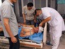 Пострадавший в результате взрывов и пожаров на складе в Китае Пострадавший в результате взрывов и пожаров на складе в Китае