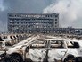 Последствия пожара на складе в Китае Последствия пожара на складе в Китае
