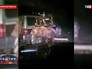 Медведь возле машины Медведь возле машины