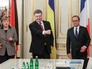 Ангела Меркель, Пётр Порошенко и Франсуа Олланд Ангела Меркель, Пётр Порошенко и Франсуа Олланд