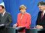 Франсуа Олланд, Ангела Меркель и Пётр Порошенко Франсуа Олланд, Ангела Меркель и Пётр Порошенко