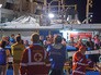 Спасенные беженцы с затонувшего корабля Спасенные беженцы с затонувшего корабля