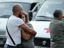 Горожане на подстанции скорой медицинской помощи в Симферополе, где были расстреляны медики Горожане на подстанции скорой медицинской помощи в Симферополе, где были расстреляны медики