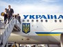 Президент Украины Пётр Порошенко с женой сходят с трапа самолёта Президент Украины Пётр Порошенко с женой сходят с трапа самолёта