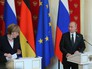 Канцлер Германии Ангела Меркель и президент России Владимир Путин Канцлер Германии Ангела Меркель и президент России Владимир Путин