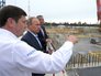 Владимир Путин в ходе осмотра строительной площадки космодрома "Восточный" в 2014 г. Владимир Путин в ходе осмотра строительной площадки космодрома "Восточный" в 2014 г.