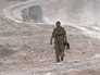 Боец иранского отряда "Фатимиюн", воюющего на стороне официального Дамаска и сирийской армии Боец иранского отряда "Фатимиюн", воюющего на стороне официального Дамаска и сирийской армии