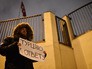 Молодой человек с плакатом во время акции протеста у посольства Турции в Москве Молодой человек с плакатом во время акции протеста у посольства Турции в Москве