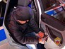 Задержанный в машине полиции Задержанный в машине полиции