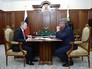 Президент России Владимир Путин и генеральный директор, председатель правления российской газовой компании ОАО "Новатэк" Леонид Михельсон во время встречи Президент России Владимир Путин и генеральный директор, председатель правления российской газовой компании ОАО "Новатэк" Леонид Михельсон во время встречи