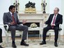 Президент России Владимир Путин и эмир государства Катар шейх Тамим бен Хамад Аль Тани во время встречи в Кремле Президент России Владимир Путин и эмир государства Катар шейх Тамим бен Хамад Аль Тани во время встречи в Кремле
