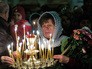 Женщина во время поминальной службы по жертвам авиакатастрофы А321 Женщина во время поминальной службы по жертвам авиакатастрофы А321