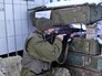Украинские военные ведут стрельбу Украинские военные ведут стрельбу